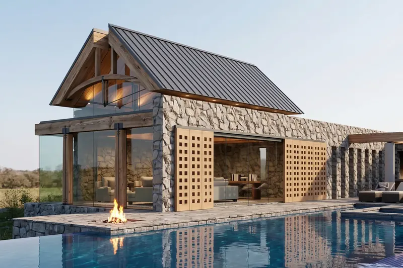 Stone and timber pool house with a standing-seam roof, glass gable end, perforated wood sliding screens and a firepit