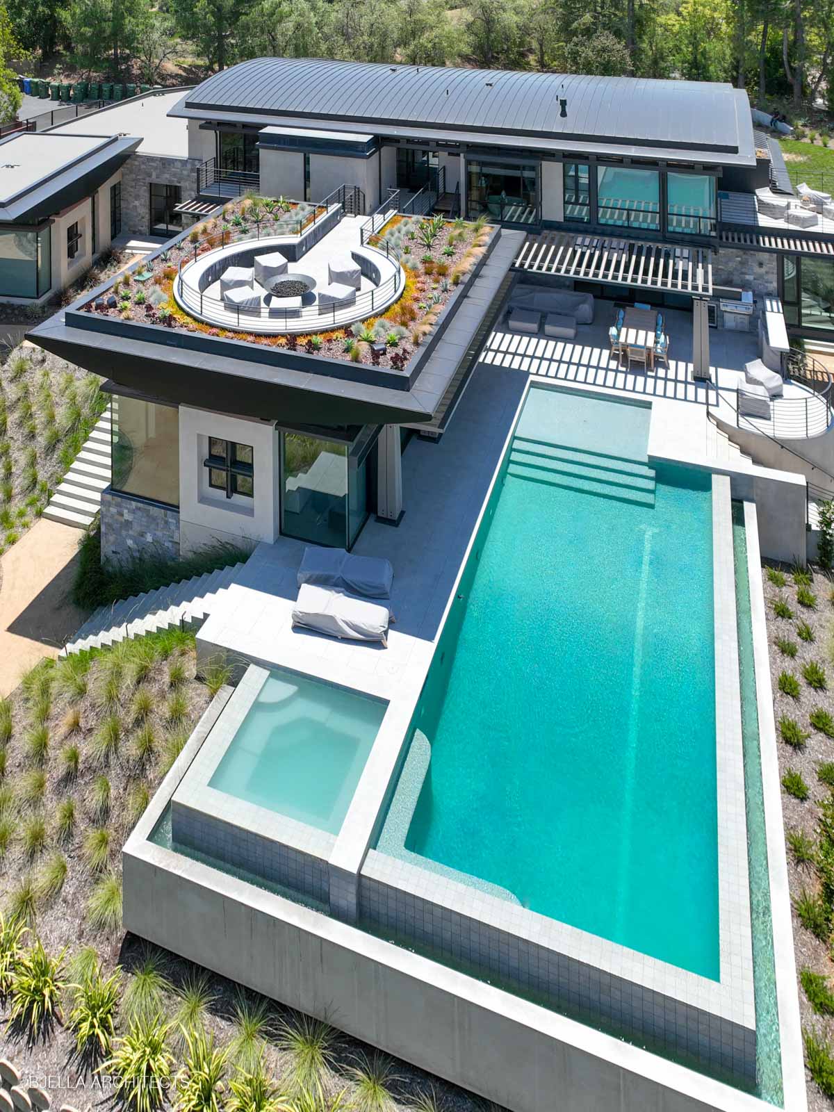 Aerial view of rooftop fire terrace and infinity pool