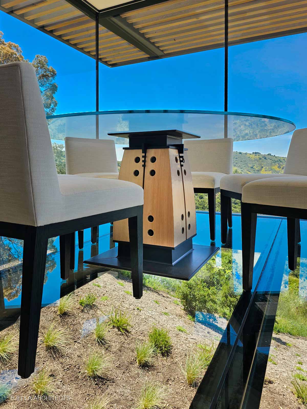 The dinette from the garden below, floating on glass