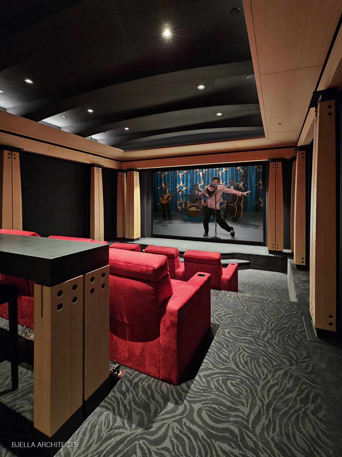 Plush reclining seats facing the screen