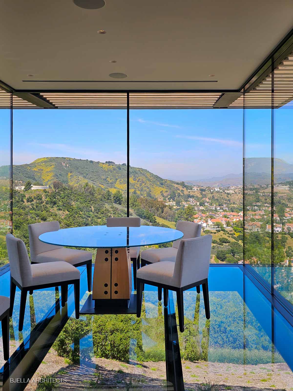 The glass dinette floating over the valley