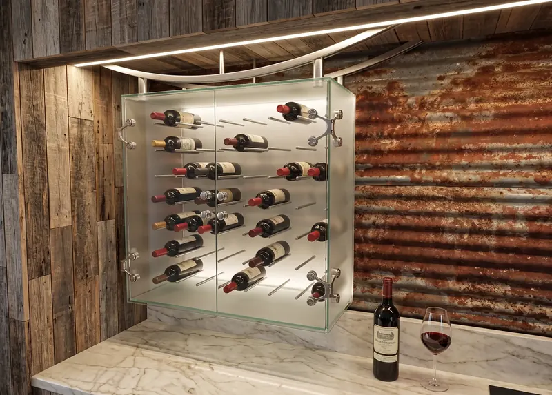 Suspended glass wine cabinet with bottles on steel pegs, hung from curved steel arms above a marble counter
