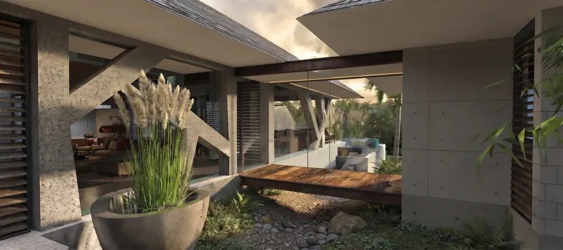 Wooden bridge crossing a planted rock garden between concrete wings, with a glimpse into the living room