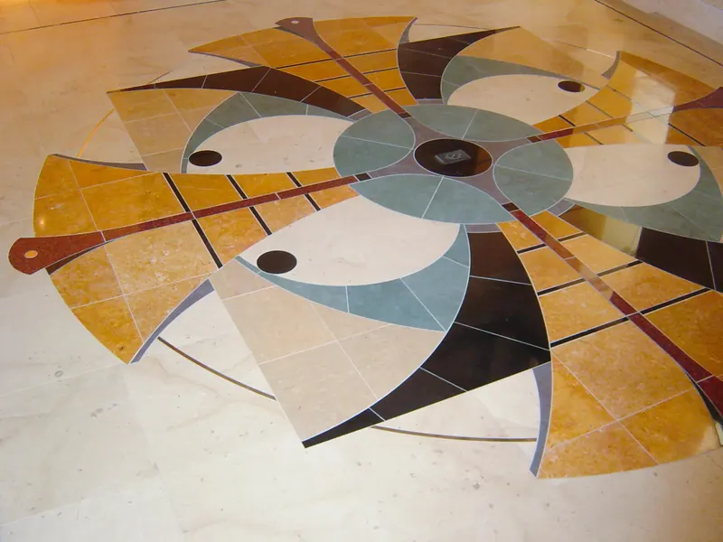 Multi-colored geometric stone medallion in the foyer floor