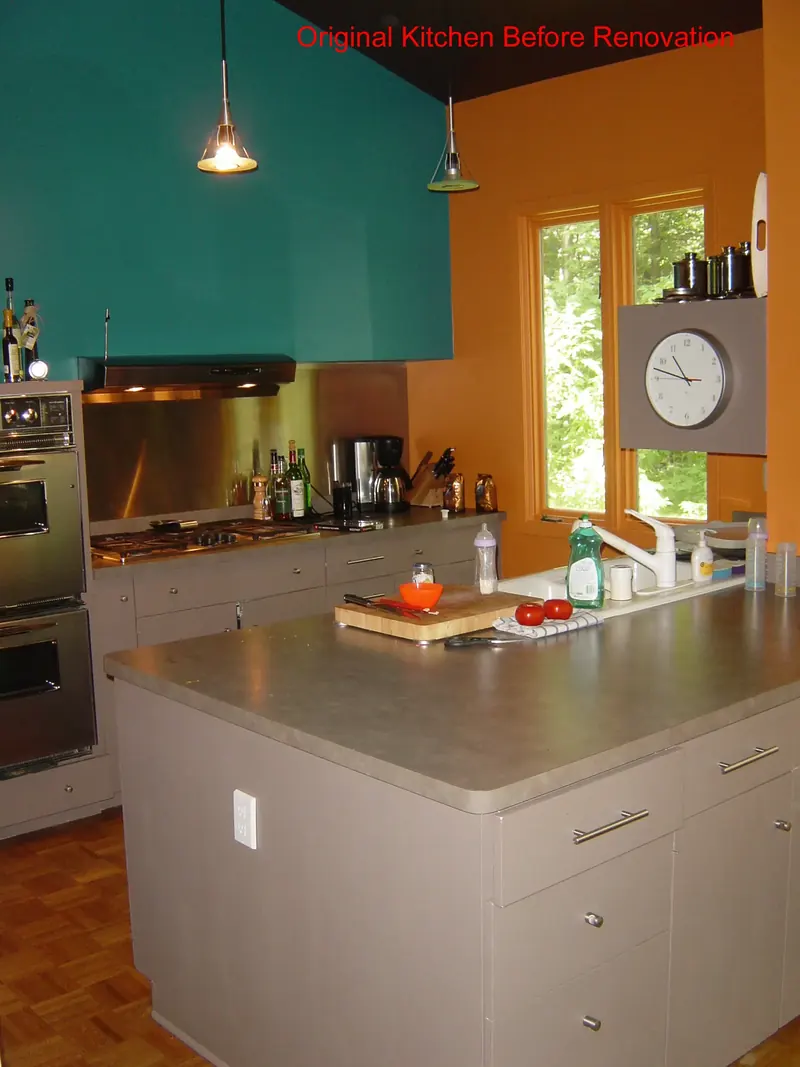 The original island and teal range hood, before the remodel