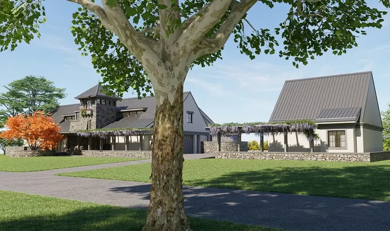 Driveway approach past a large shade tree to the stone-towered house and a wisteria pergola leading to the detached garage