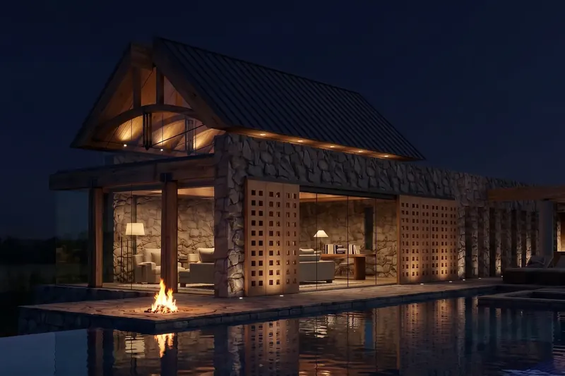 Modern Colorado Farmhouse at night, warm light glowing through gridded screens and a fire reflected in the pool