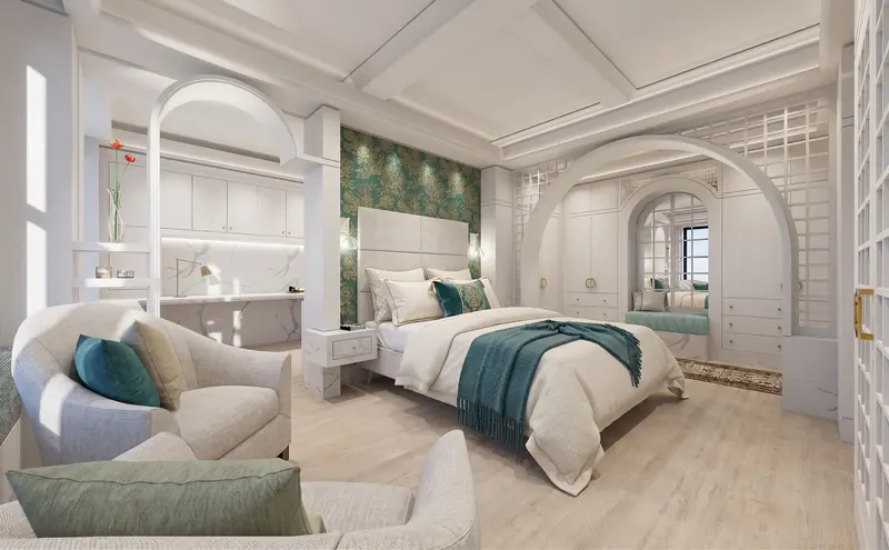 Bedroom with teal floral wallpaper, coffered ceiling, a marble-backed desk alcove and an arched window seat