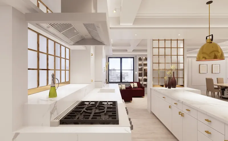 Kitchen cooktop and marble counters looking toward red armchairs and a city-view window