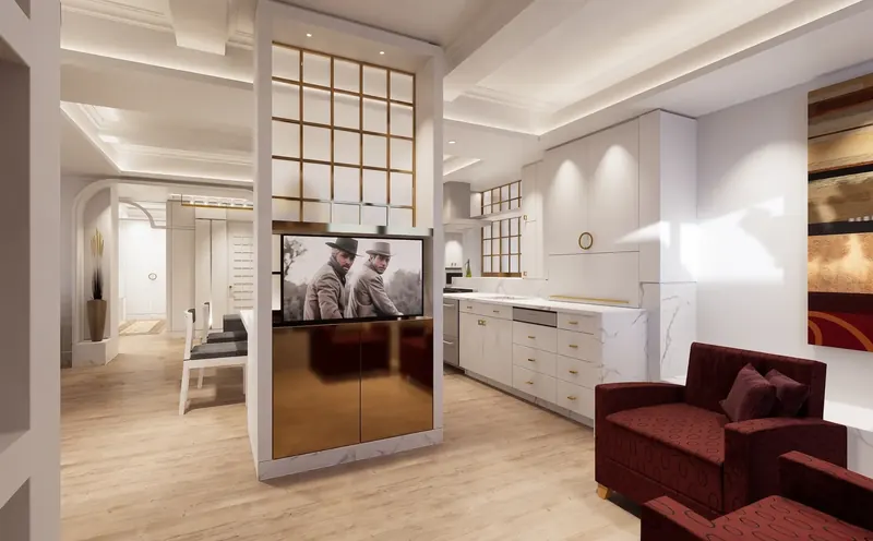 Brass-clad media cabinet with a brass-gridded screen beside the white kitchen cabinetry and red armchairs
