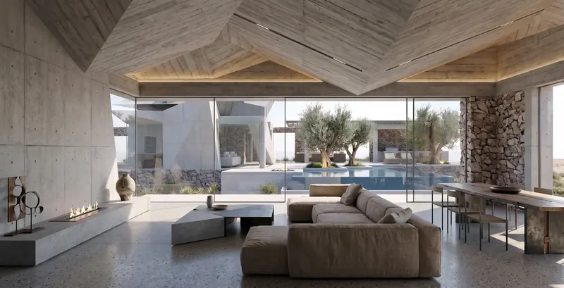 Guest house living room with a faceted ceiling, linear fireplace and glass walls facing the pool and main house
