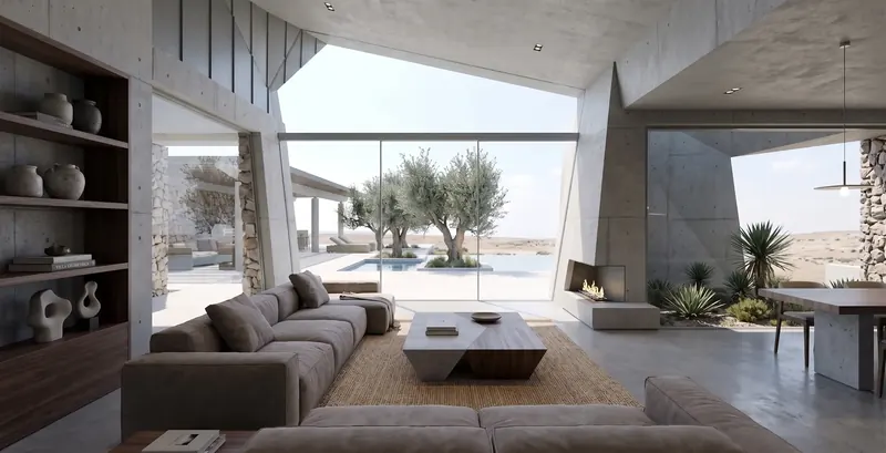 Living area with a low sofa, corner fireplace and floor-to-ceiling glass looking out to the pool and olive trees