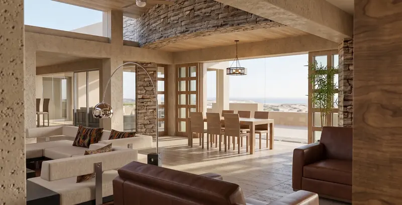 Open living and dining area with stone walls, a wood ceiling and full-height glass opening to a terrace