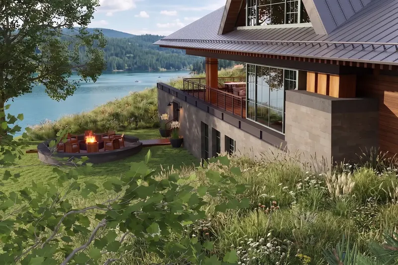Stone block lower level and railed deck beside a circular fire pit, with the lake and forested hills beyond