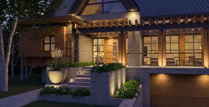 Entry at dusk with uplit concrete planters, warm light through the front door and porch windows, garage door below