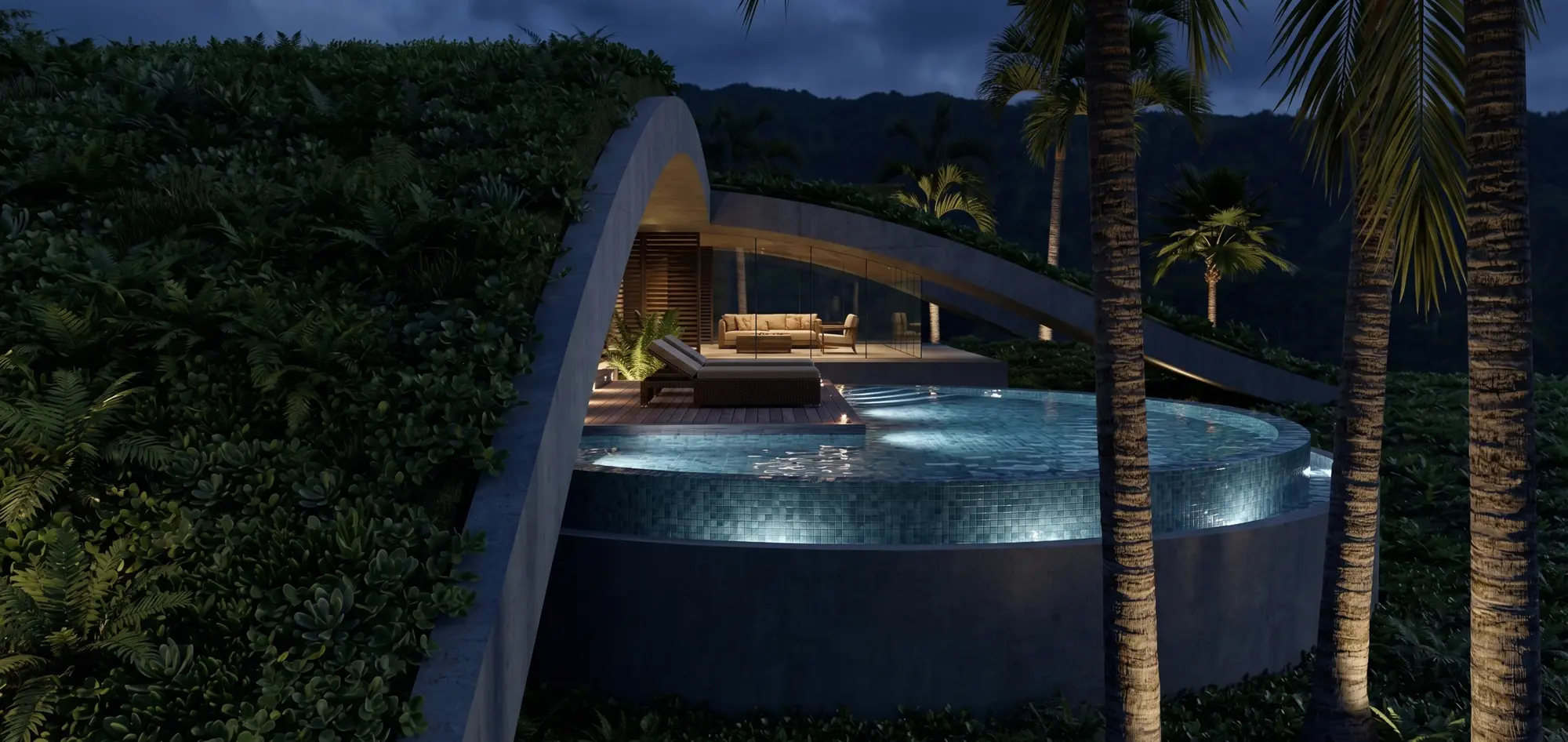 Illuminated circular plunge pool and lounge beneath a concrete arch at night, with dark mountains behind