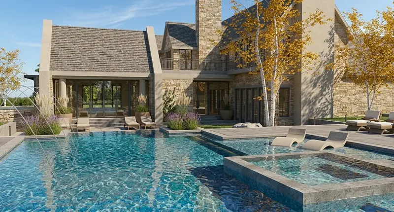 Rear of the Tennessee estate with a multi-tiered pool, arcing water jets, in-water loungers and birch trees in autumn color