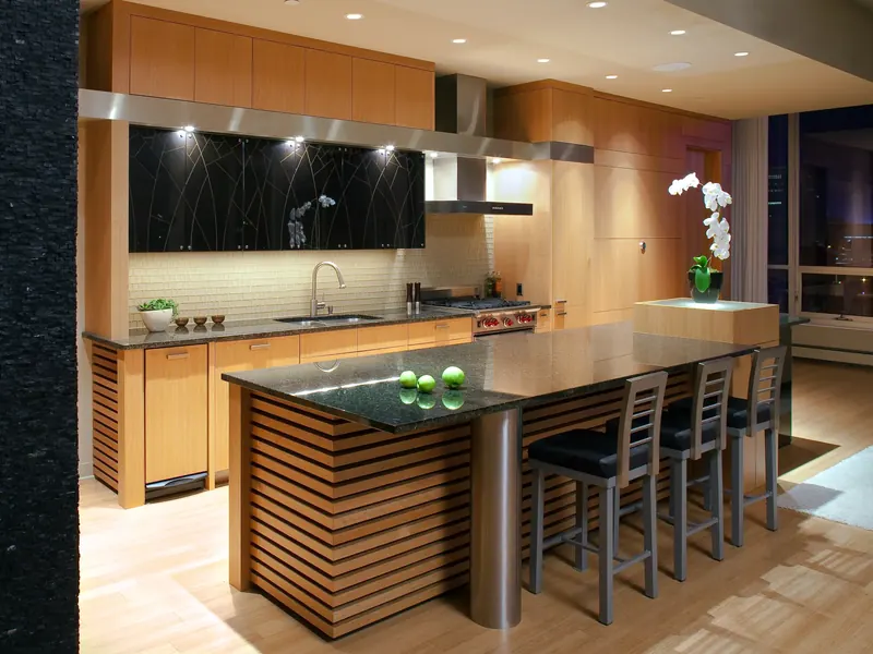 Geometric Modern Kitchen in Tampa with slatted wood island, black granite top and black glass cabinets