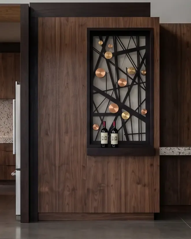 Dark wood wine cellar door with a black geometric grille, copper and brass discs and wine bottles, Jacksonville